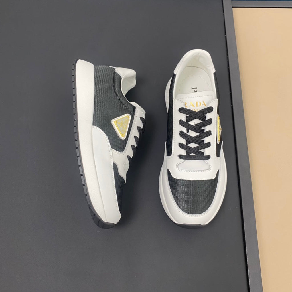 PRA SNEAKER IN WHITE CALFSKIN AND BLACK FABRIC WITH GOLDEN LOGO