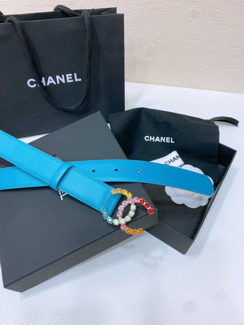 CC BELT 30 MM IN SKY BLUE CALFSKIN WITH COLORFUL RHINSTONES METAL LOGO