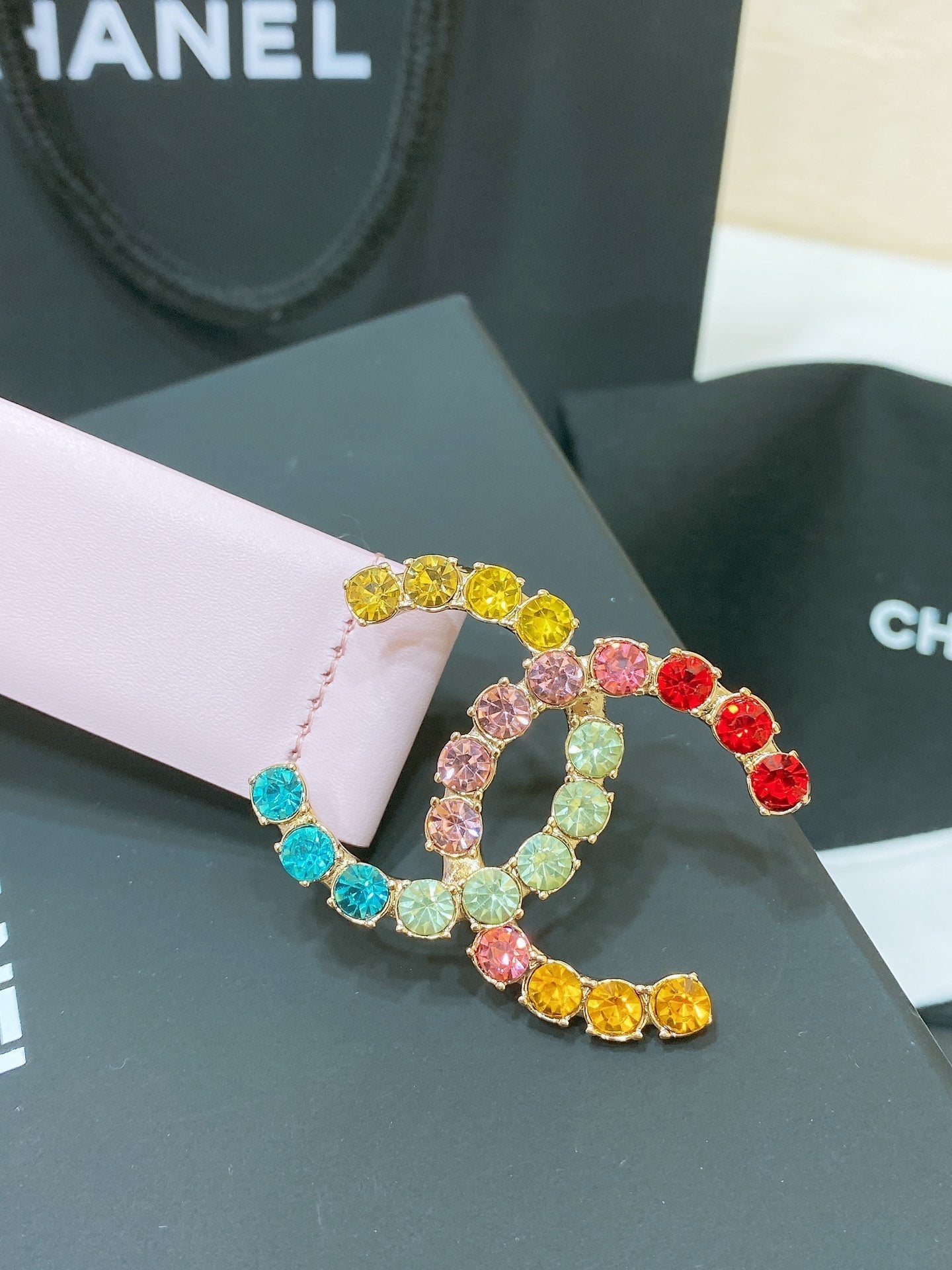 CC BELT 30 MM IN PASTEL PINK CALFSKIN WITH COLORFUL RHINSTONES METAL LOGO