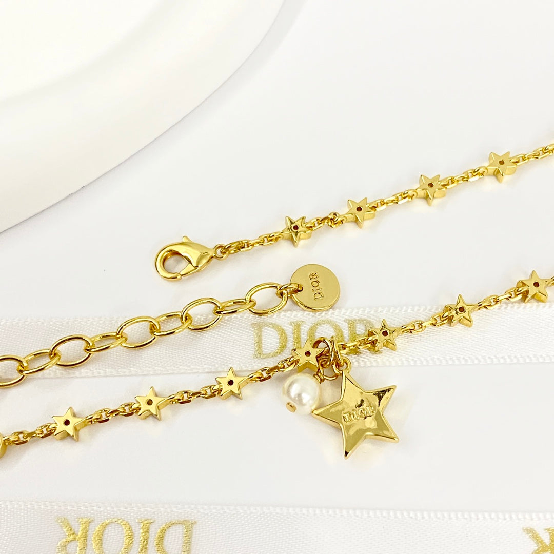 CD 26S STAR CHAIN PEARL PENDANT NECKLACE IN GOLD TONE METAL 631051