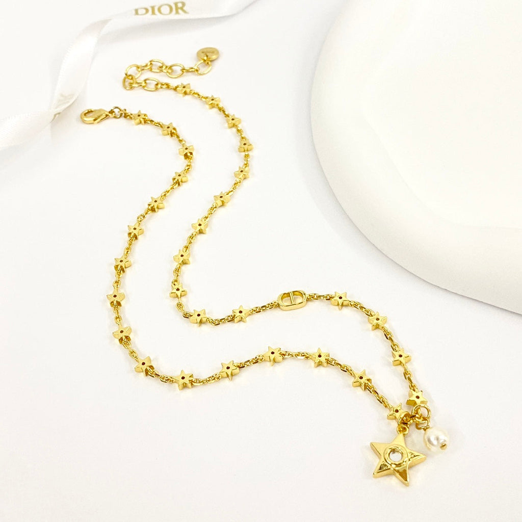 CD 26S STAR CHAIN PEARL PENDANT NECKLACE IN GOLD TONE METAL 631051