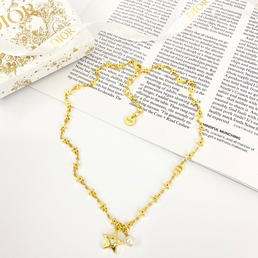 CD 26S STAR CHAIN PEARL PENDANT NECKLACE IN GOLD TONE METAL 631051