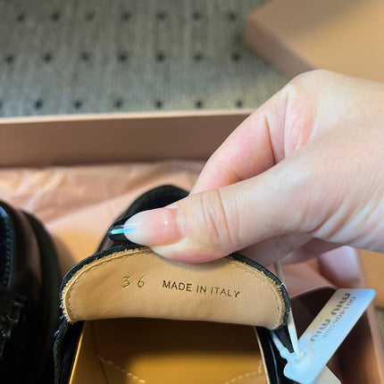 MIUMIU 26S PENNY LOAFERS IN BLACK SHINY CALFSKIN