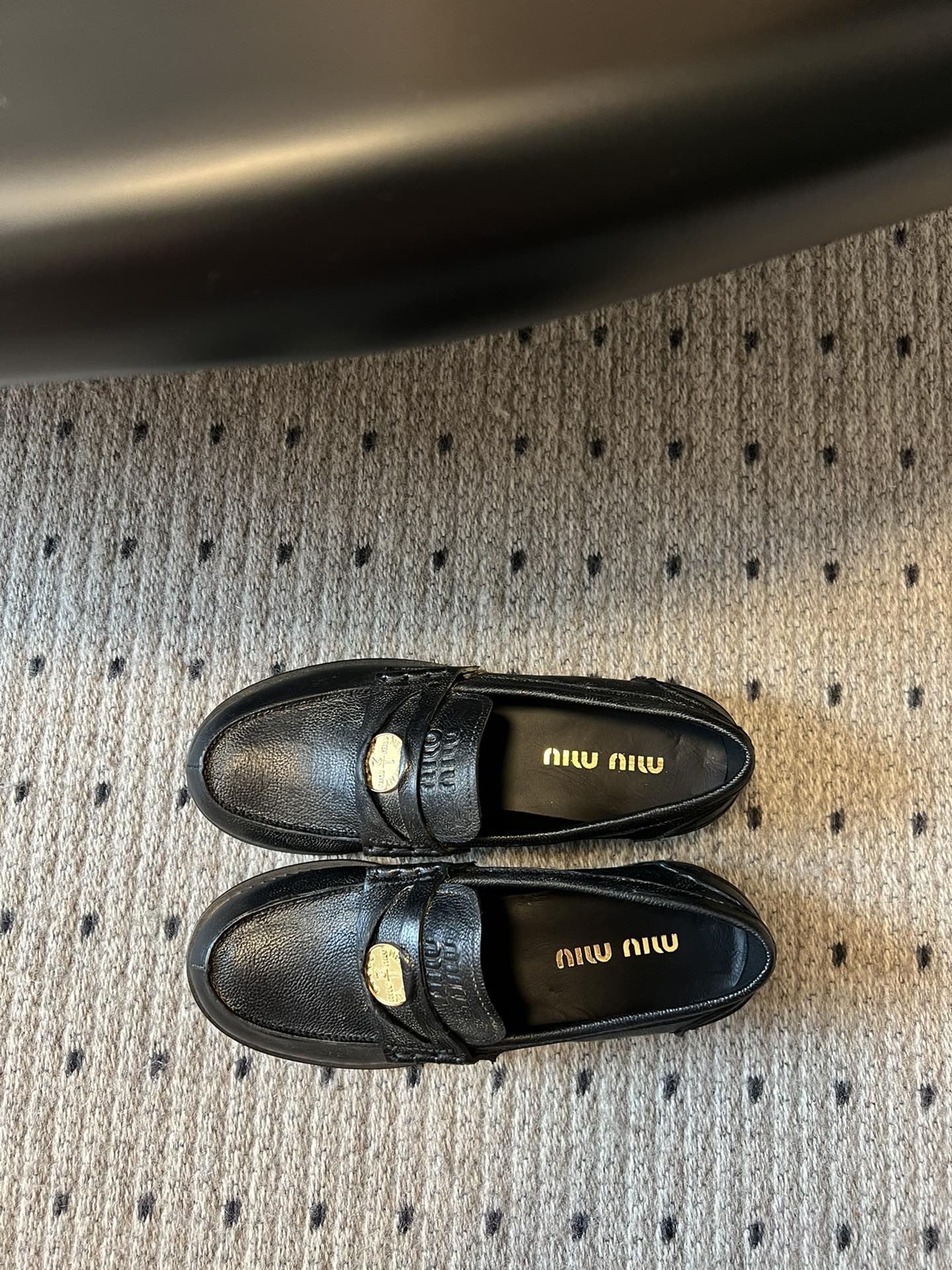 MIUMIU 26S PENNY LOAFERS IN BLACK CALFSKIN GOLD HARDWARE