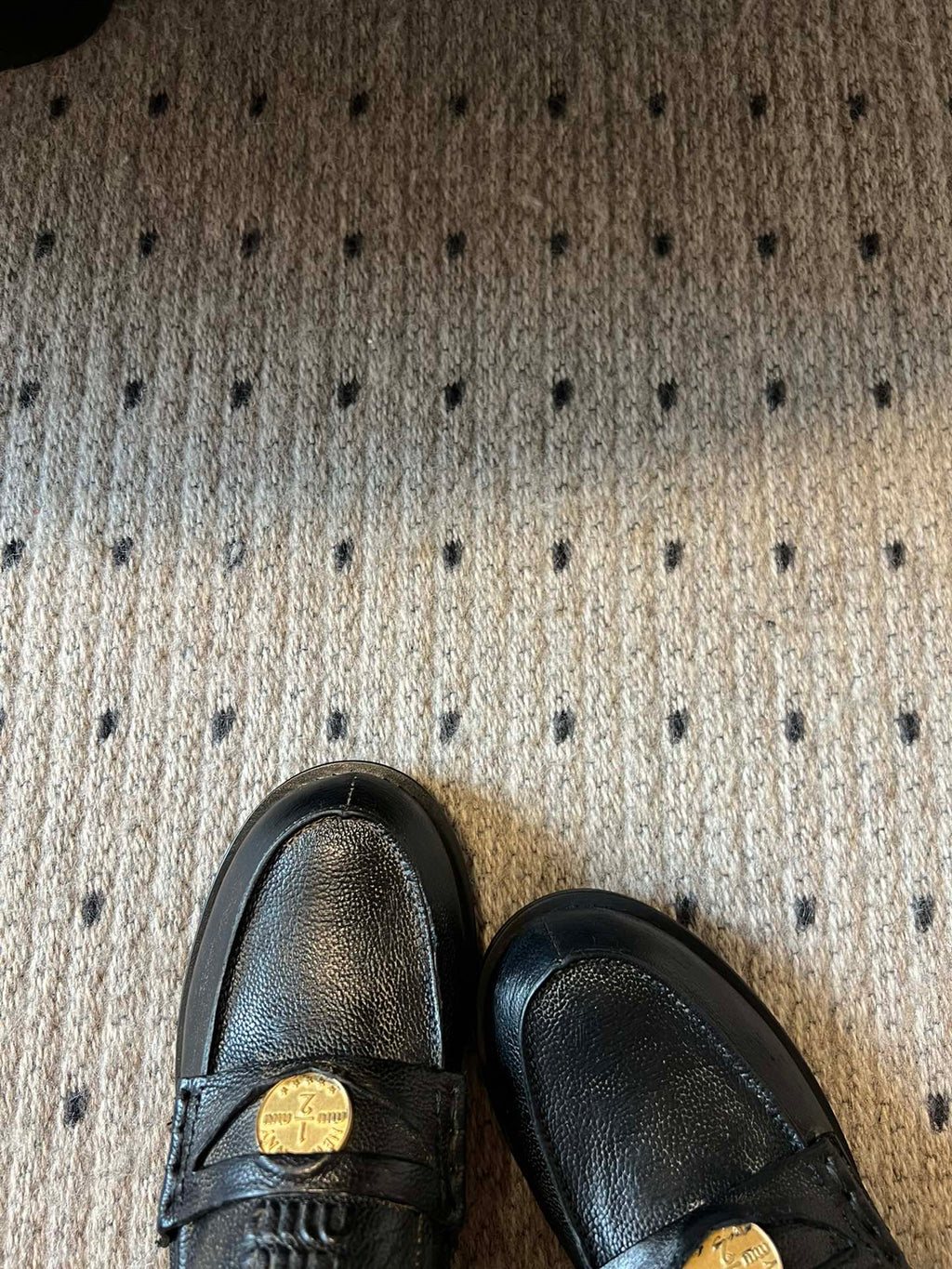 MIUMIU 26S PENNY LOAFERS IN BLACK CALFSKIN GOLD HARDWARE