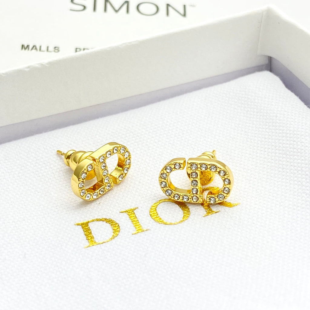 CD 26S CRYSTAL LOGO STUD EARRINGS IN GOLD METAL 633106