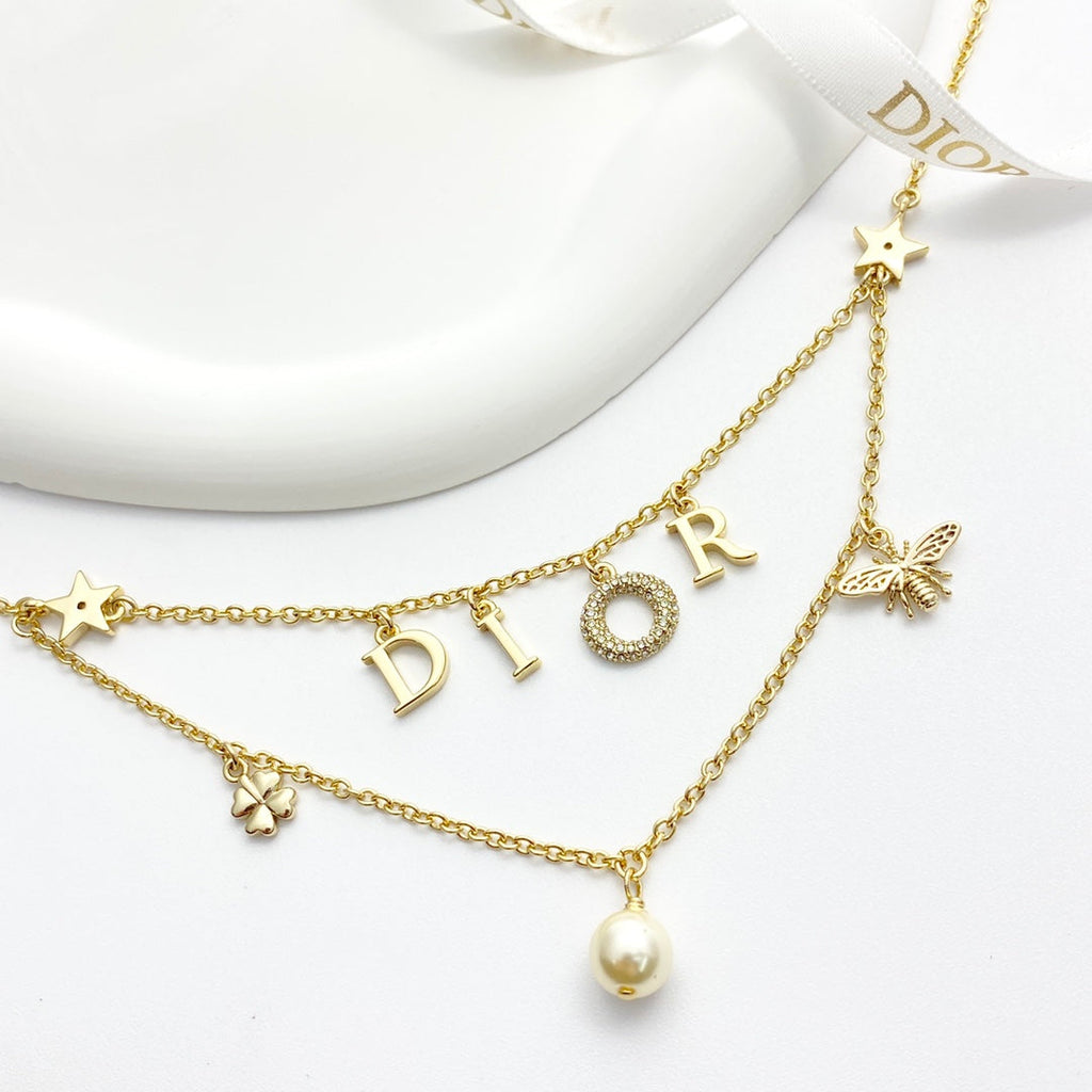CD 26S MULTI CHARM LAYERED DIOR NECKLACE WITH PEARL DROP IN GOLD TONE 631779