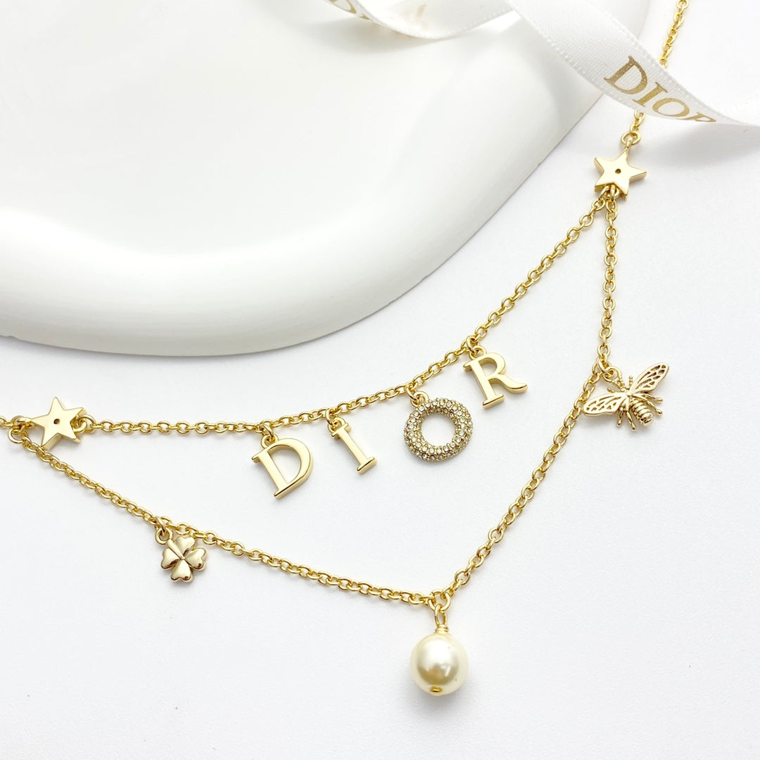CD 26S MULTI CHARM LAYERED DIOR NECKLACE WITH PEARL DROP IN GOLD TONE 631779