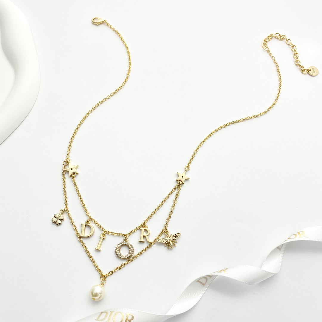 CD 26S MULTI CHARM LAYERED DIOR NECKLACE WITH PEARL DROP IN GOLD TONE 631779