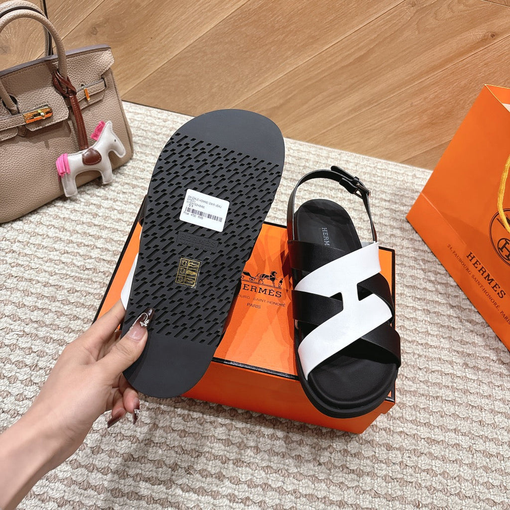 HM 26S CROSS-STRAP SANDALS IN BLACK AND WHITE CALFSKIN