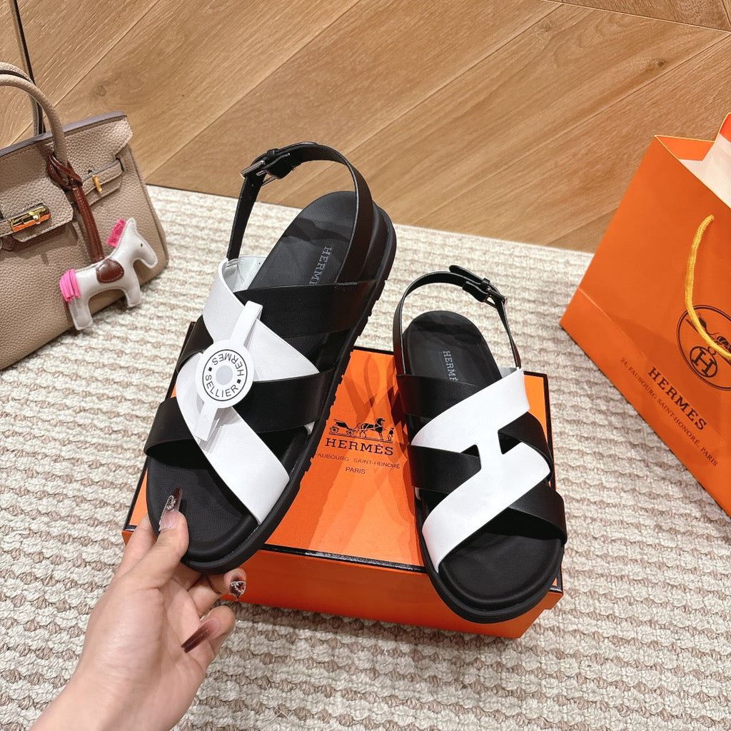 HM 26S CROSS-STRAP SANDALS IN BLACK AND WHITE CALFSKIN