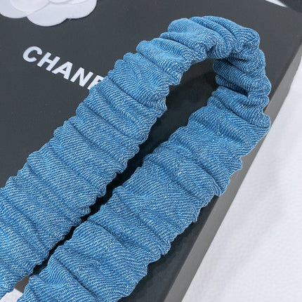DOUBLE C ELASTIC BELT 30MM IN BLUE DENIM WITH GOLD BUCKLE AND SIDE RHINESTONE DETAILING