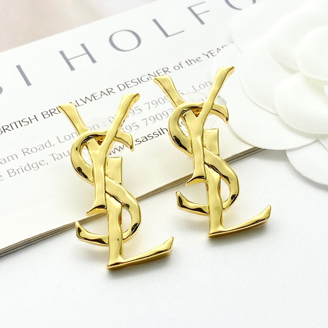 YSL 26S MONOGRAM DROP EARRINGS IN GOLD TONE METAL 629923