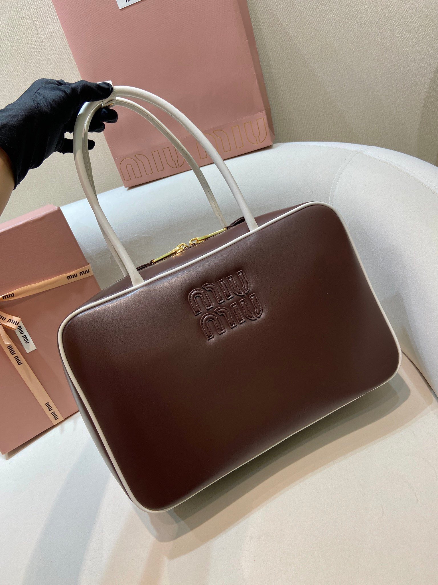 MIUMIU 26S BEAU BAG 34 IN DARK BROWN AND WHITE CALFSKIN