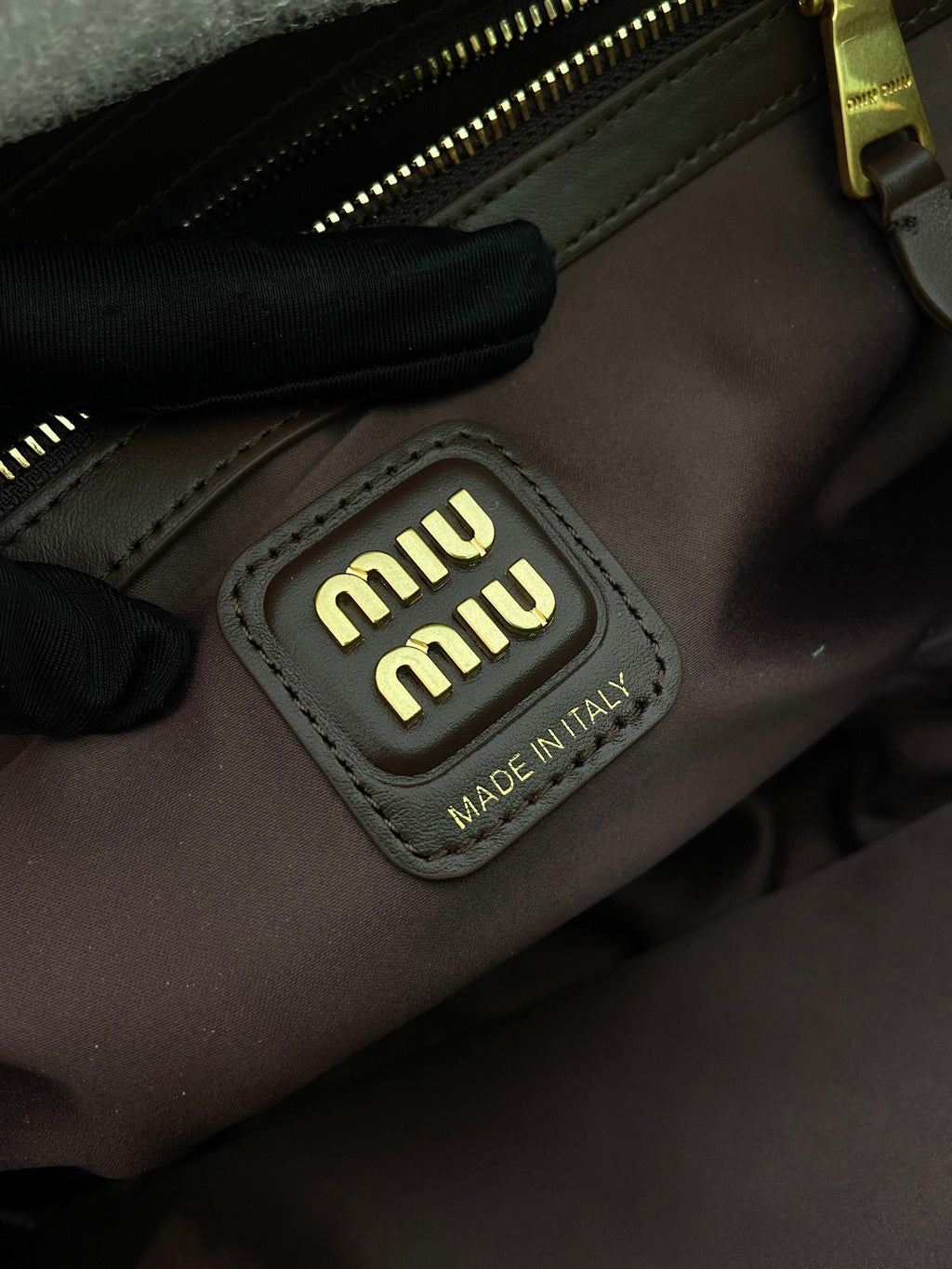 MIUMIU 26S BEAU BAG 34 IN DARK BROWN AND WHITE CALFSKIN