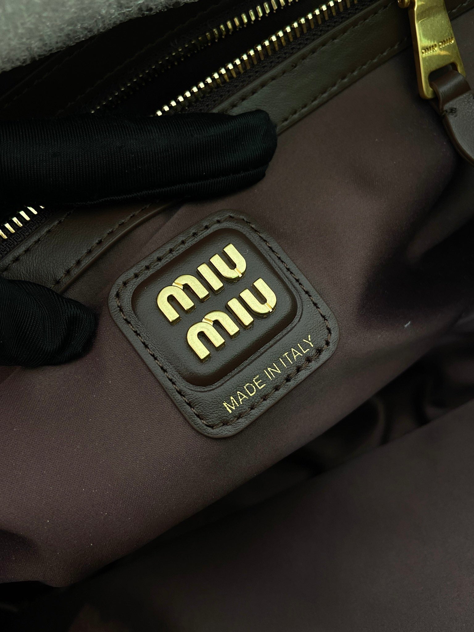 MIUMIU 26S BEAU BAG 34 IN DARK BROWN AND WHITE CALFSKIN