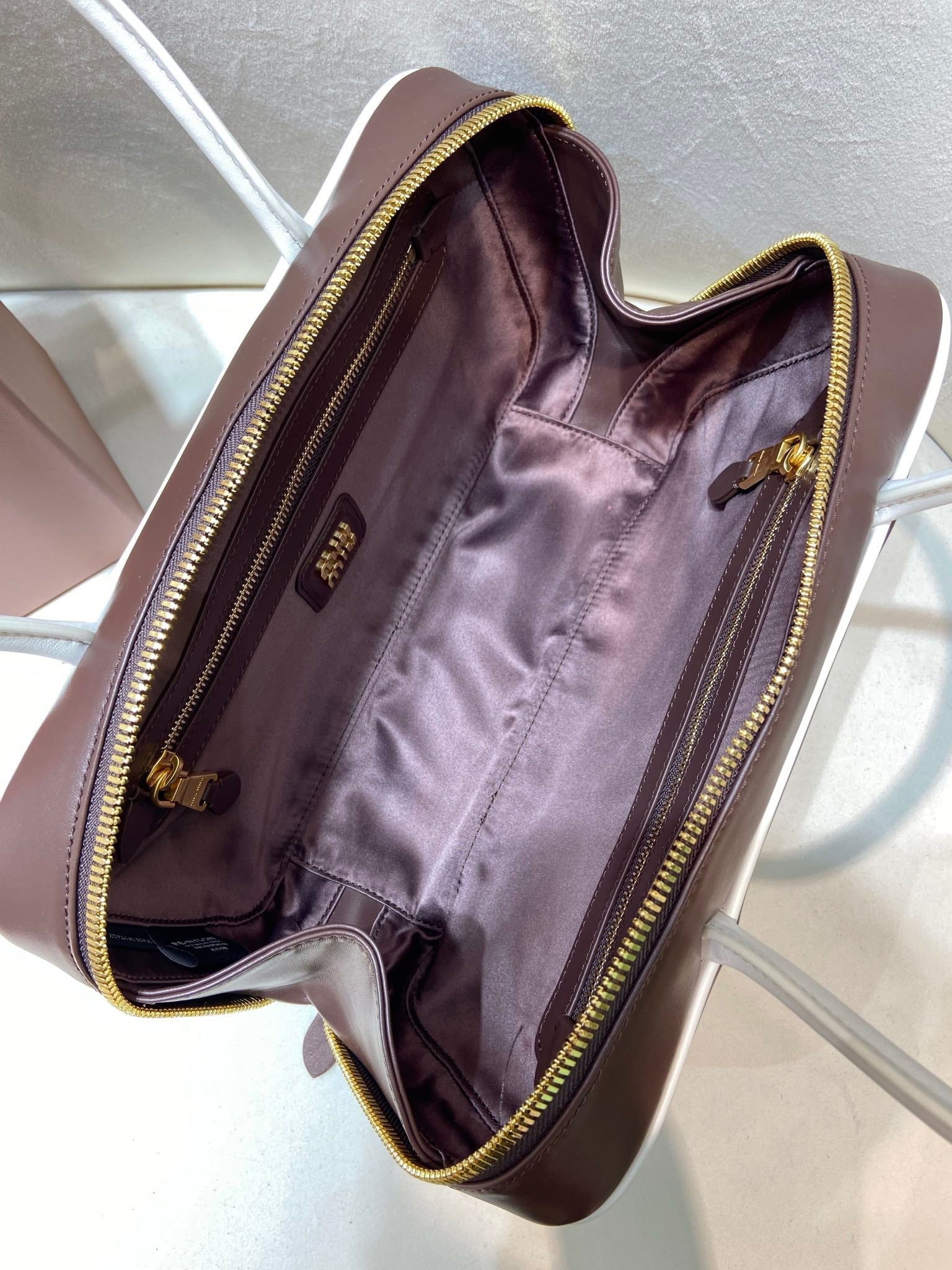 MIUMIU 26S BEAU BAG 30 IN DARK BROWN AND WHITE CALFSKIN
