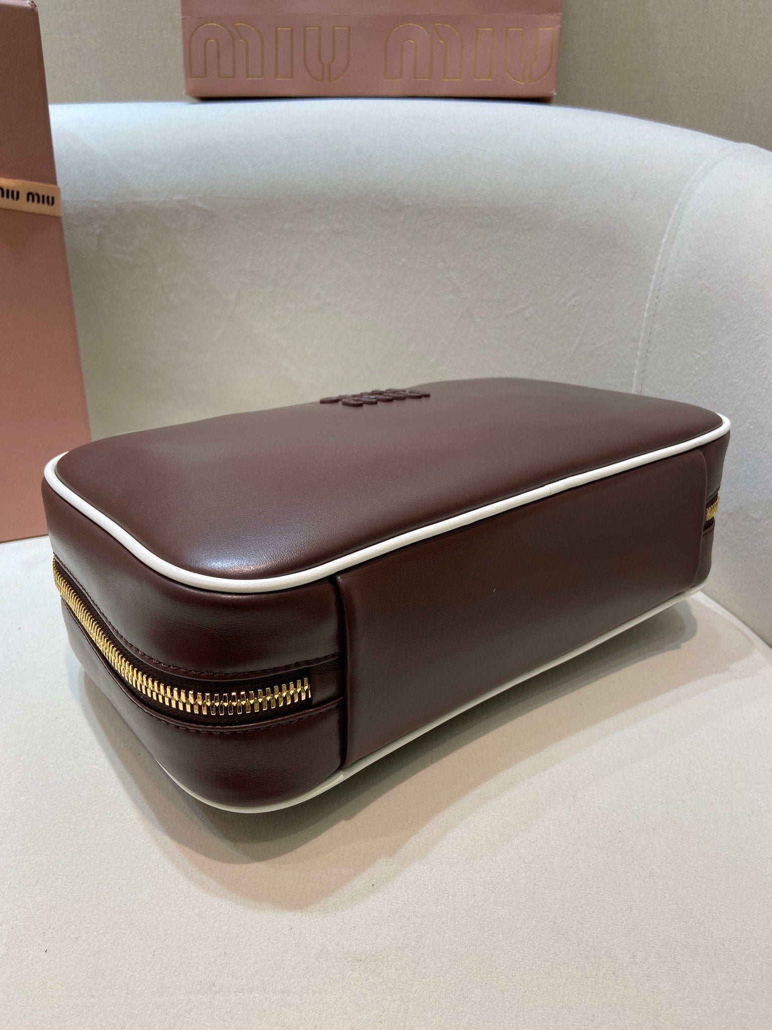 MIUMIU 26S BEAU BAG 30 IN DARK BROWN AND WHITE CALFSKIN