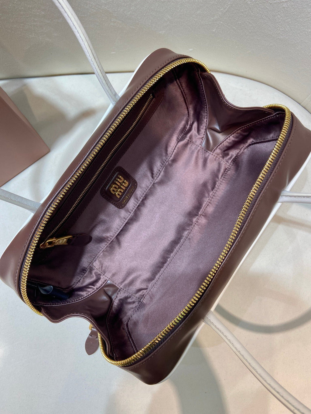 MIUMIU 26S BEAU BAG 28 IN DARK BROWN AND WHITE CALFSKIN