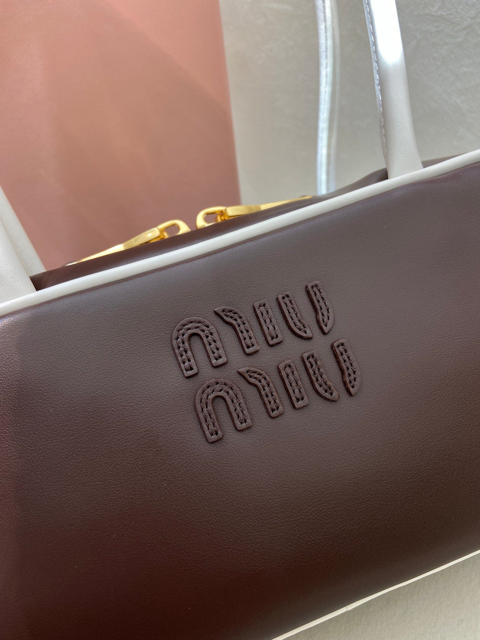 MIUMIU 26S BEAU BAG 28 IN DARK BROWN AND WHITE CALFSKIN