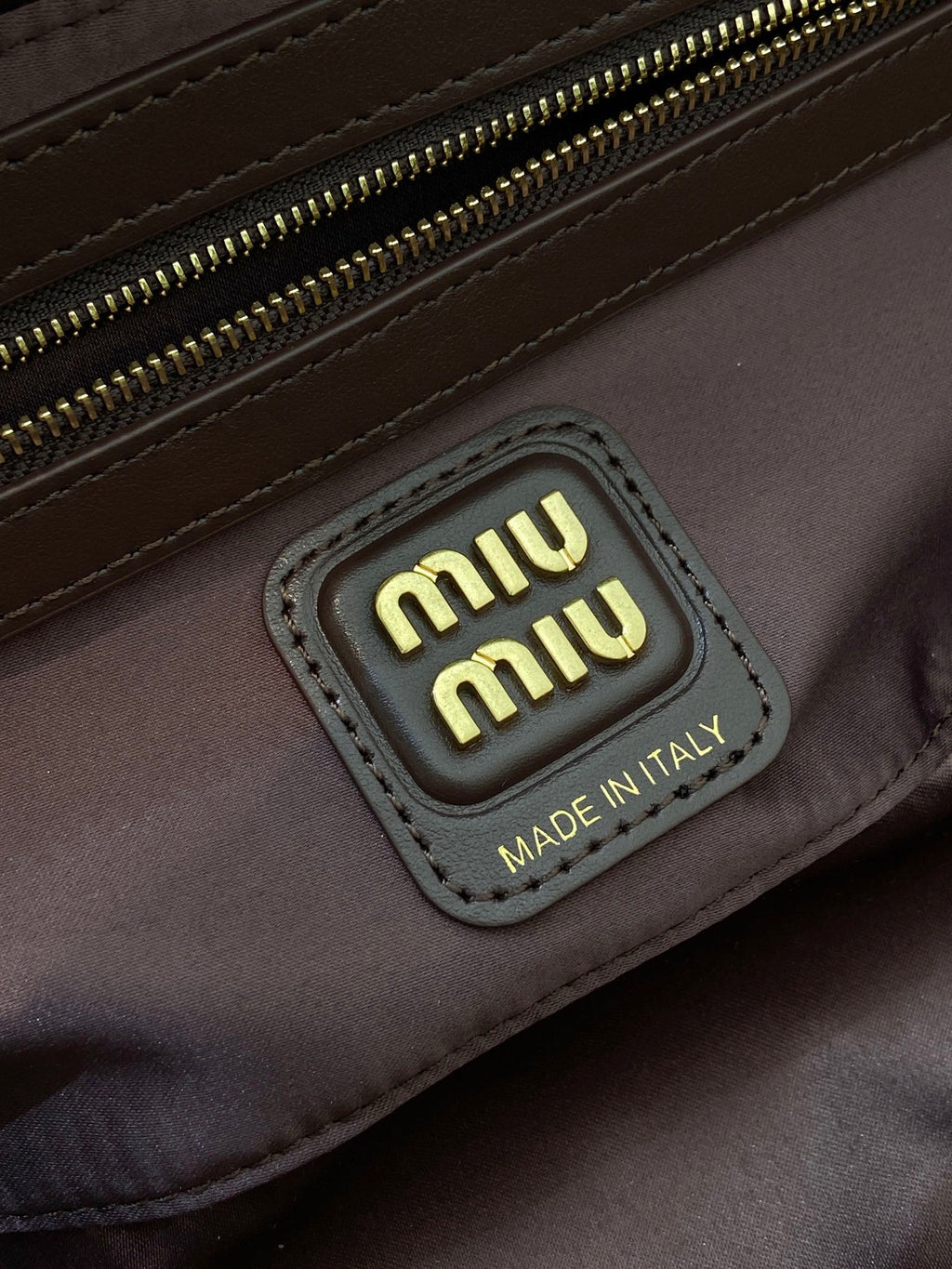 MIUMIU 26S BEAU BAG 28 IN DARK BROWN AND WHITE CALFSKIN