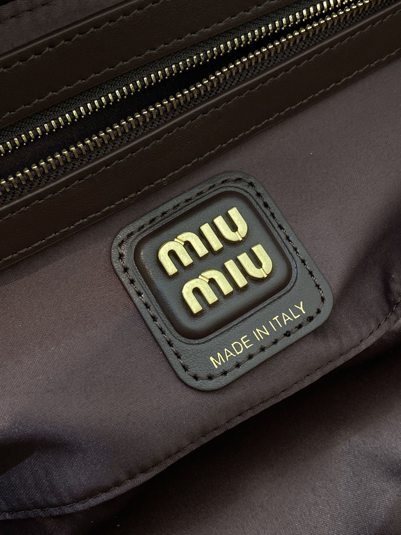 MIUMIU 26S BEAU BAG 28 IN DARK BROWN AND WHITE CALFSKIN