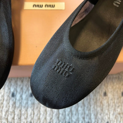 MIUMIU 26S BALLERINAS IN BLACK MESH FABRIC