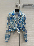 VERSACE SILK SHIRT WITH CORAL PRINT AND NOTCHED COLLAR