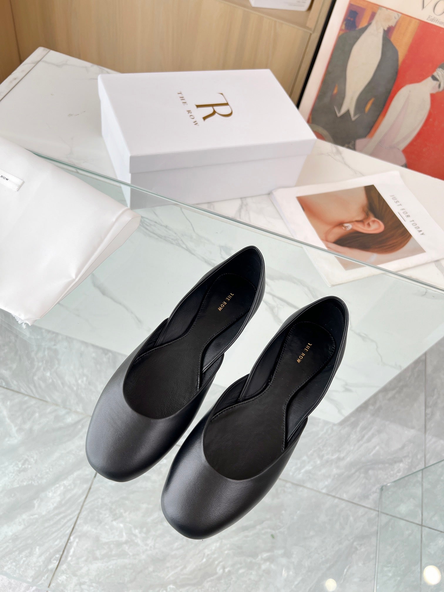 THE ROW 26S ROUND TOE BALLET FLATS IN BLACK CALFSKIN