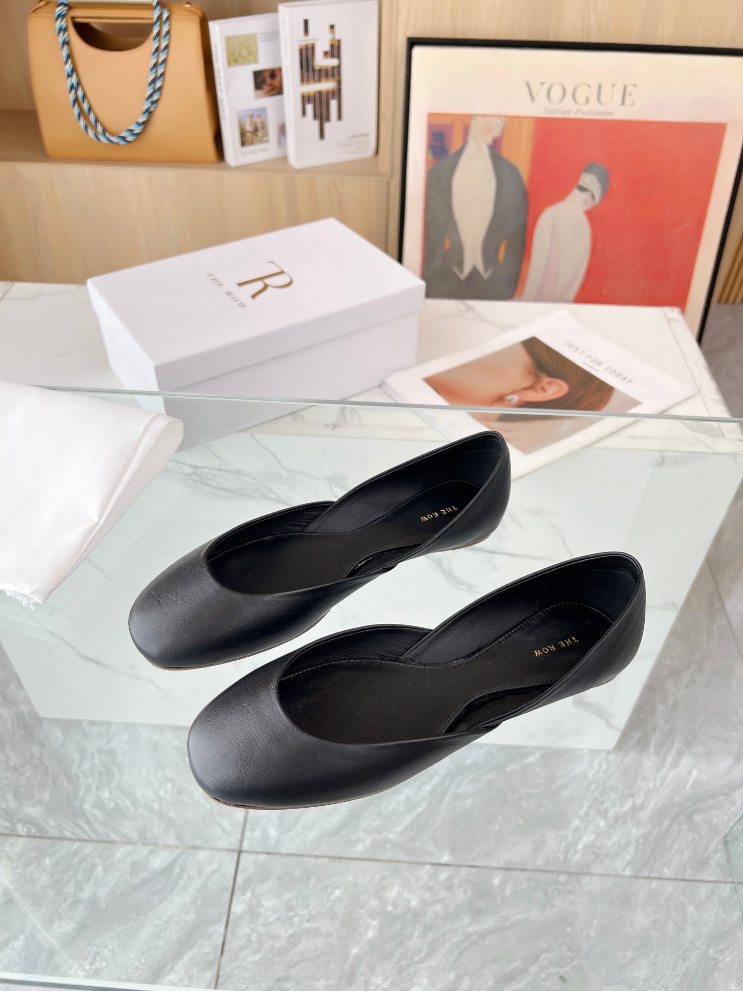 THE ROW 26S ROUND TOE BALLET FLATS IN BLACK CALFSKIN
