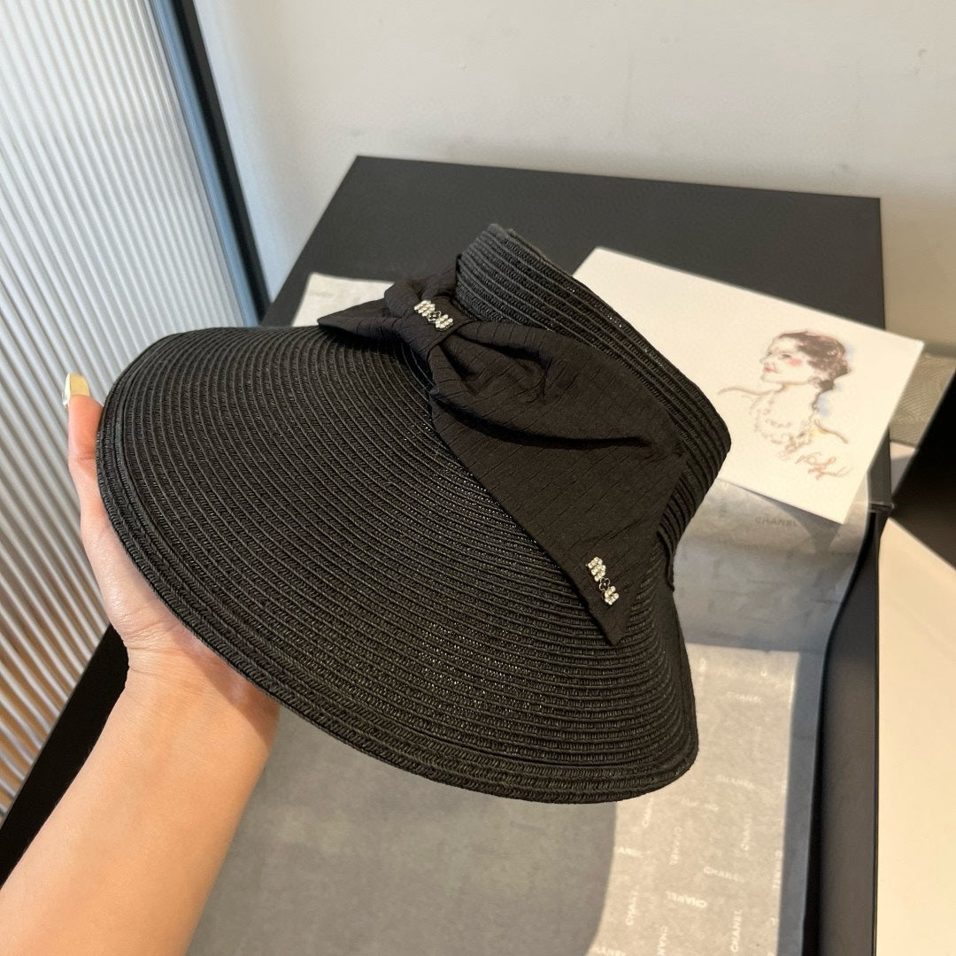 MIUMIU OPEN-TOP STRAW HAT IN BLACK WITH LARGE BOW
