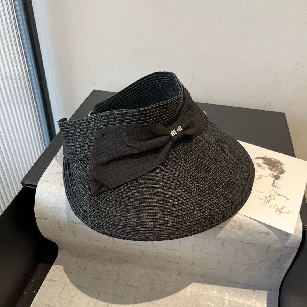MIUMIU OPEN-TOP STRAW HAT IN BLACK WITH LARGE BOW