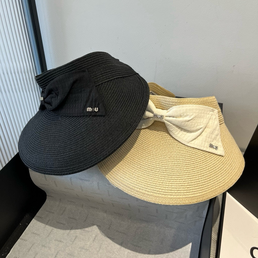 MIUMIU OPEN-TOP STRAW HAT IN BLACK WITH LARGE BOW