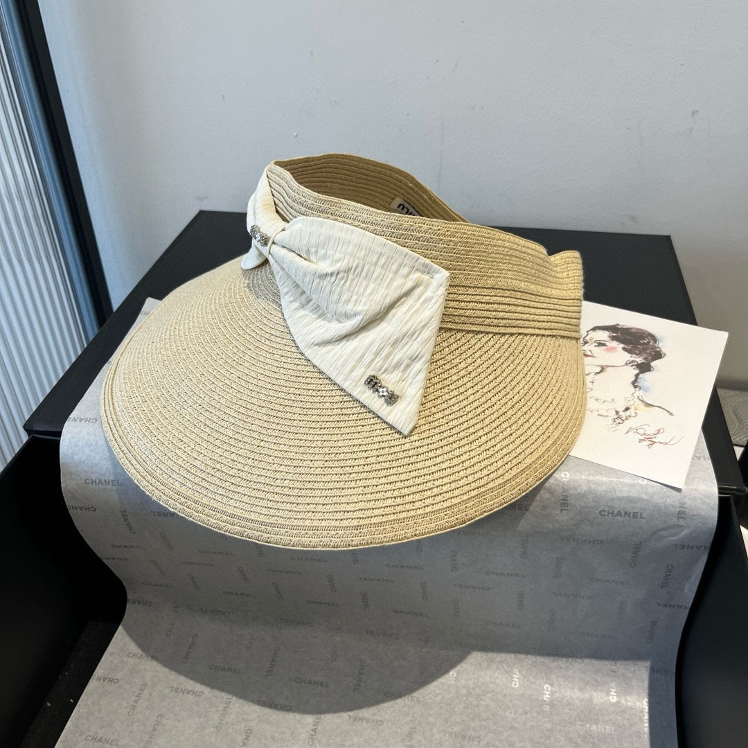 MIUMIU OPEN-TOP STRAW HAT IN LIGHT BEIGE WITH LARGE BOW