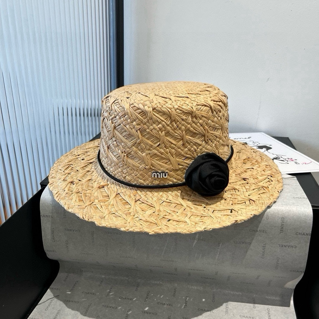 MIUMIU STRAW HAT IN BEIGE RAFFIA WITH BLACK FLOWER ACCENT