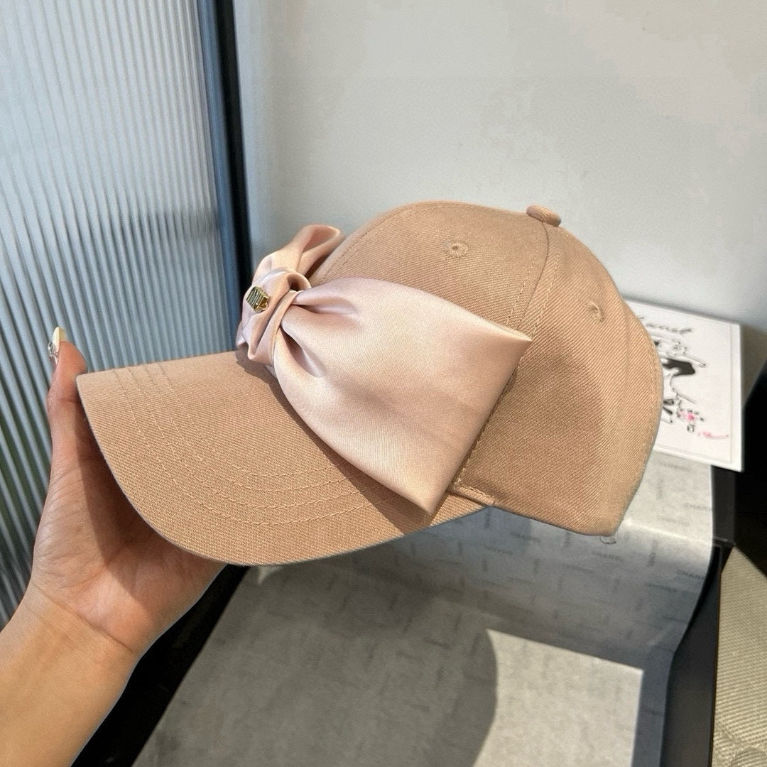 MIUMIU BASEBALL CAP IN BEIGE FABRIC WITH LARGE PINK BOW