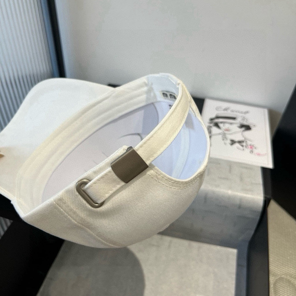 MIUMIU BASEBALL CAP IN WHITE FABRIC WITH LARGE BLACK BOW