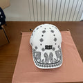 MIUMIU BASEBALL CAP IN WHITE WITH BLACK EMBROIDERED PATTERN