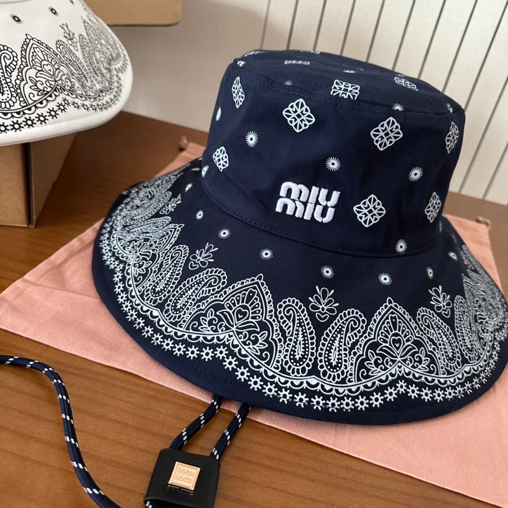 MIUMIU BUCKET IN BLACK FABRIC WITH EMBROIDERED PATTERN