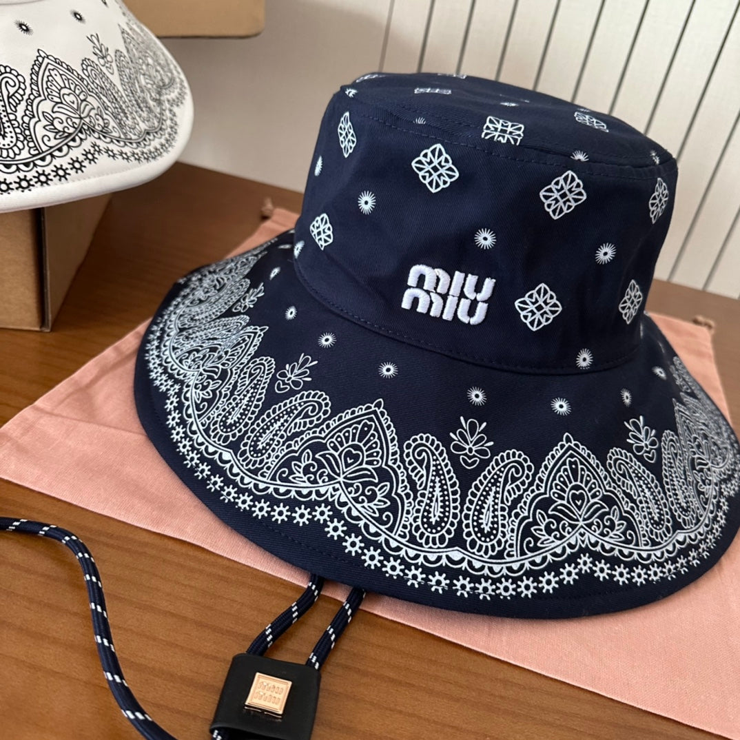 MIUMIU BUCKET IN BLACK FABRIC WITH EMBROIDERED PATTERN