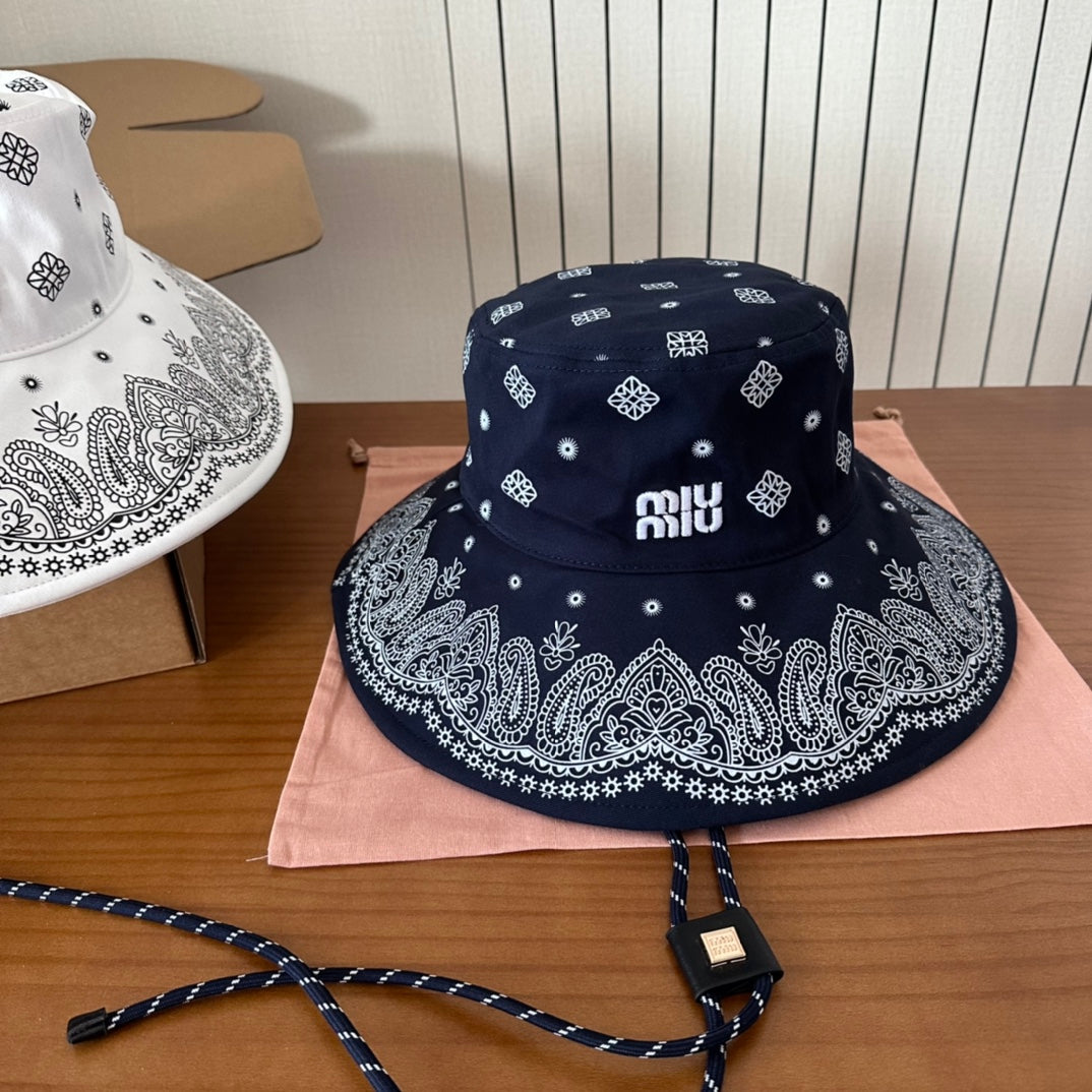 MIUMIU BUCKET IN BLACK FABRIC WITH EMBROIDERED PATTERN