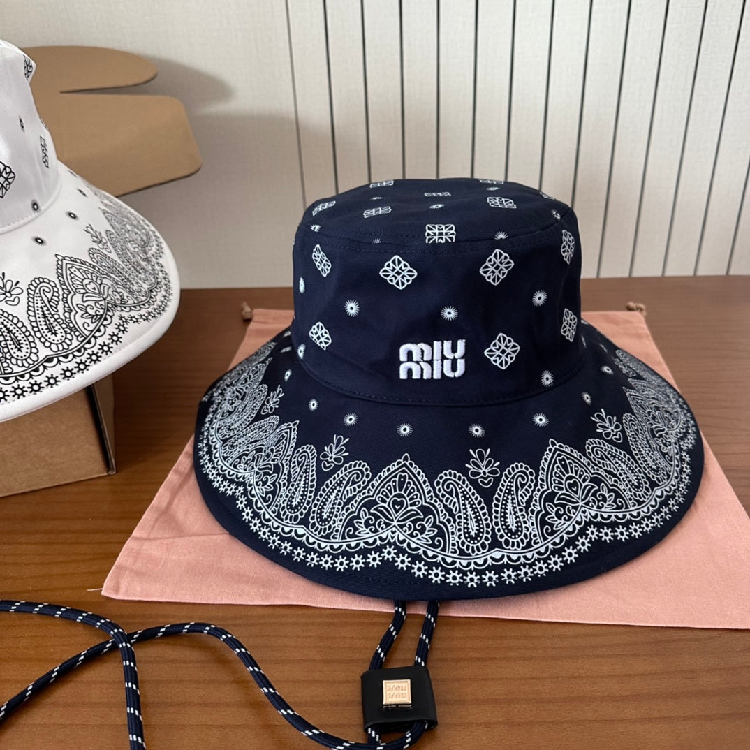 MIUMIU BUCKET IN BLACK FABRIC WITH EMBROIDERED PATTERN