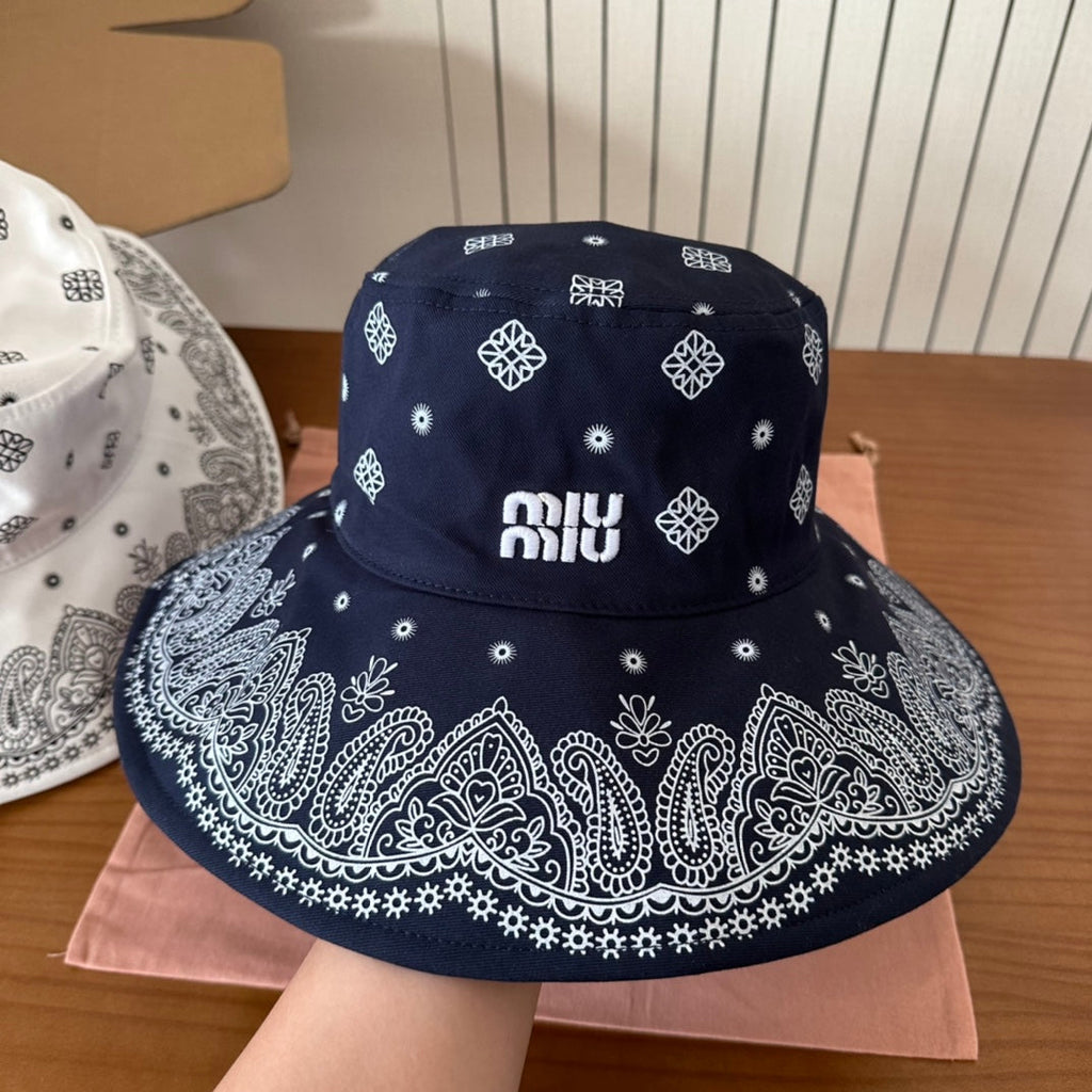 MIUMIU BUCKET IN BLACK FABRIC WITH EMBROIDERED PATTERN