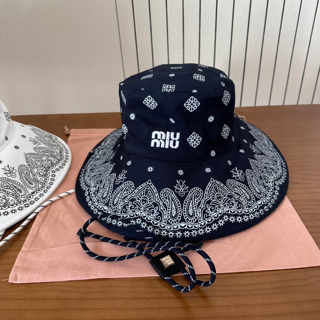 MIUMIU BUCKET IN BLACK FABRIC WITH EMBROIDERED PATTERN