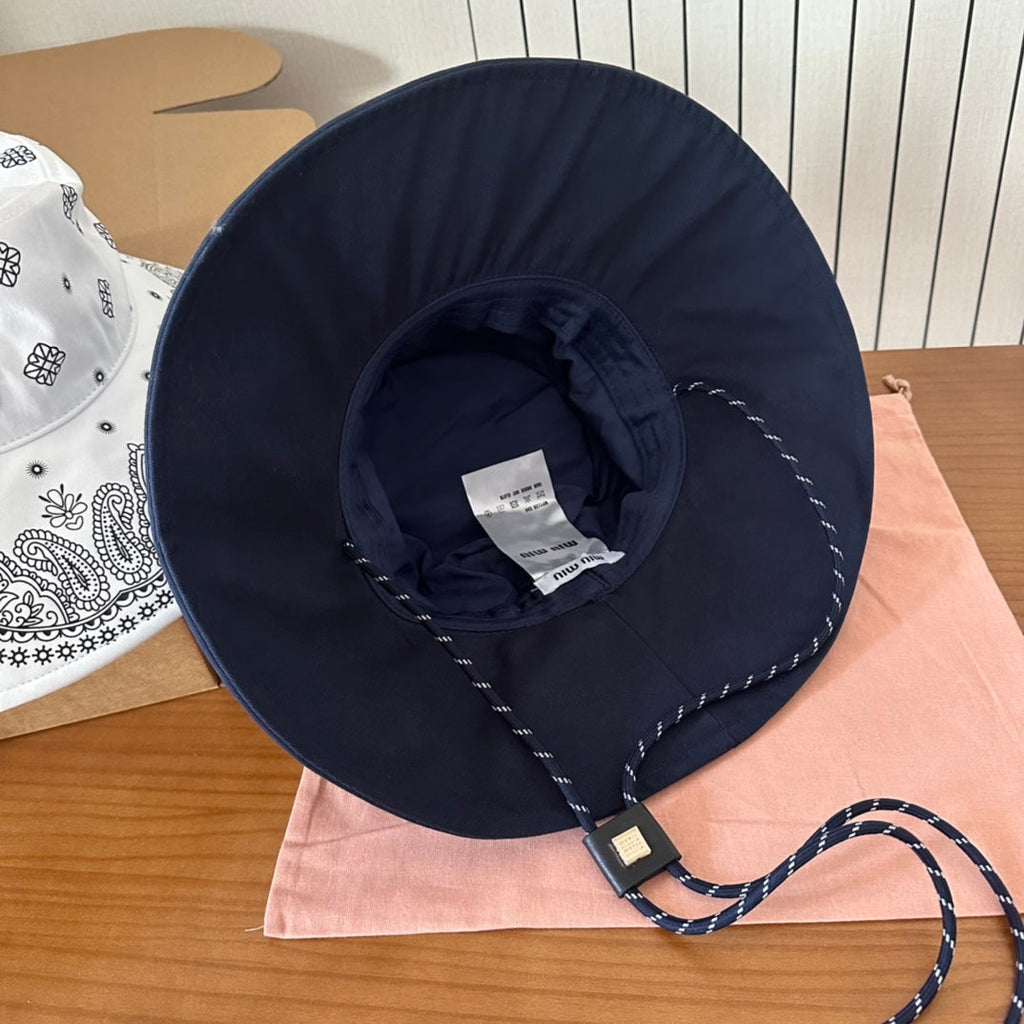 MIUMIU BUCKET IN BLACK FABRIC WITH EMBROIDERED PATTERN