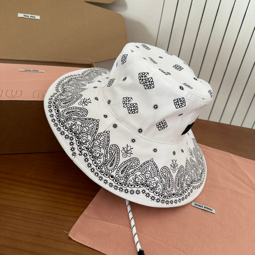 MIUMIU BUCKET IN WHITE FABRIC WITH BLACK EMBROIDERED PATTERN