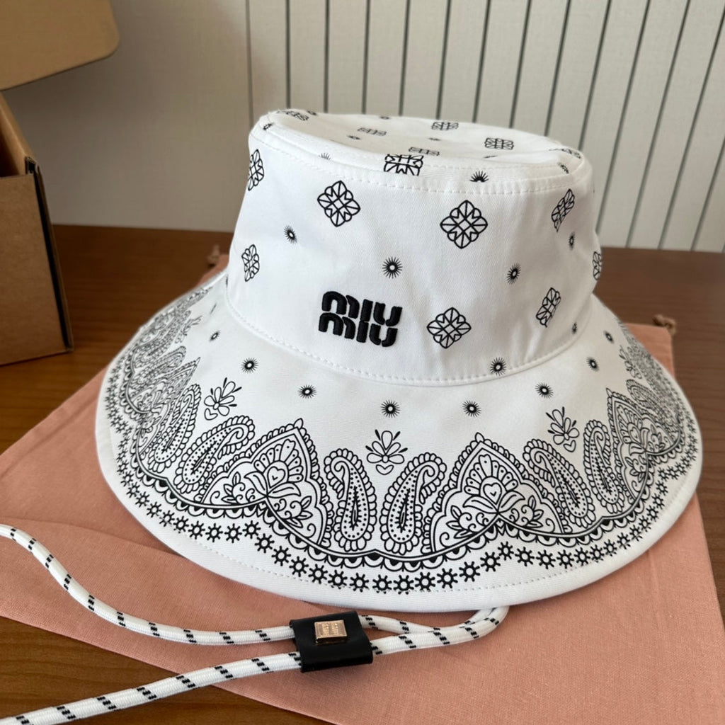 MIUMIU BUCKET IN WHITE FABRIC WITH BLACK EMBROIDERED PATTERN