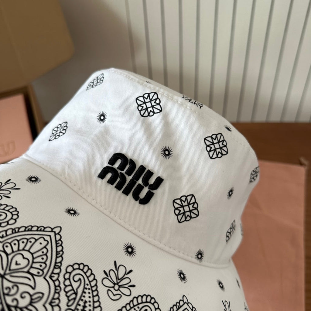 MIUMIU BUCKET IN WHITE FABRIC WITH BLACK EMBROIDERED PATTERN