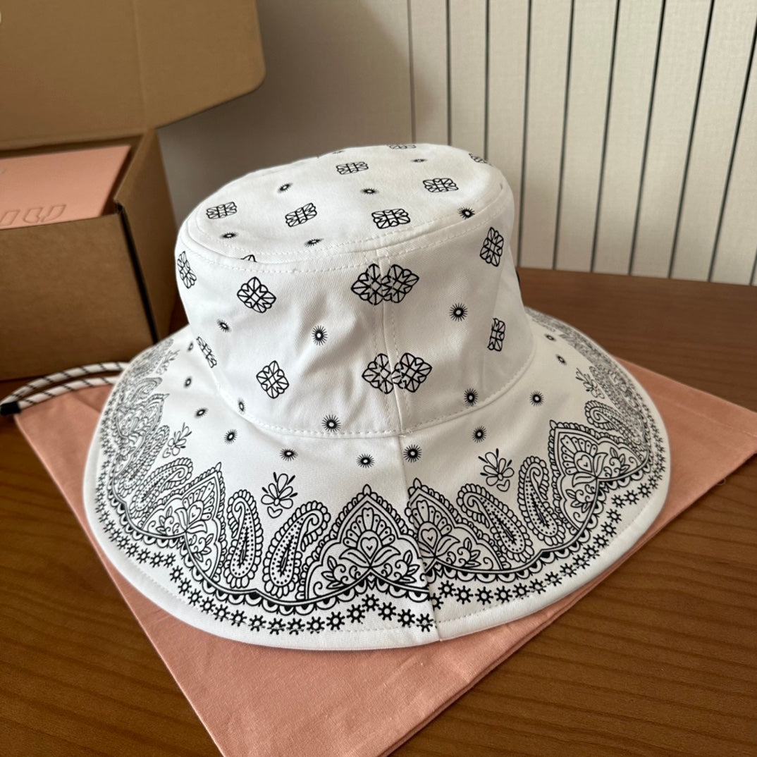 MIUMIU BUCKET IN WHITE FABRIC WITH BLACK EMBROIDERED PATTERN