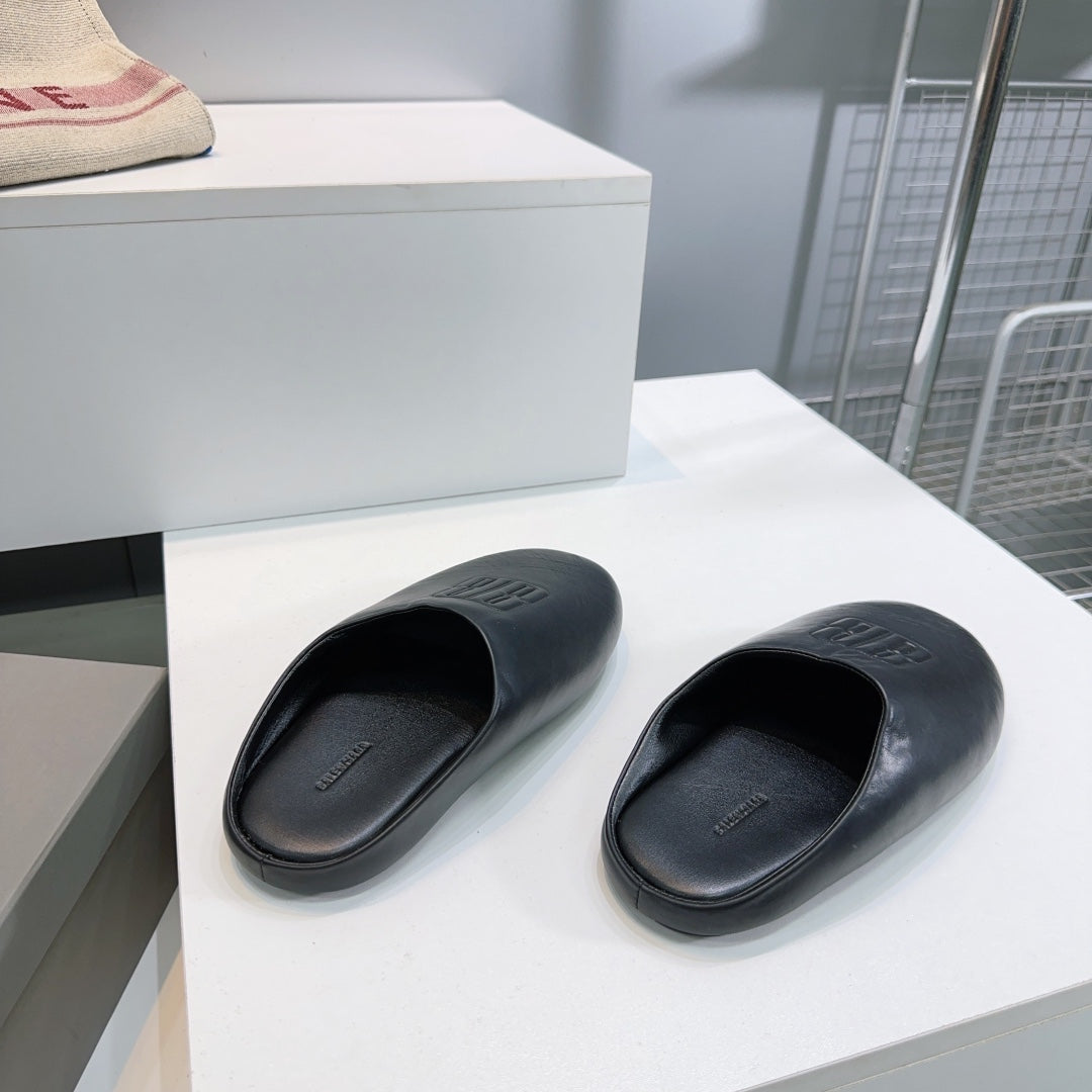 BALENCIAGA 25S MULES IN BLACK LAMBSKIN